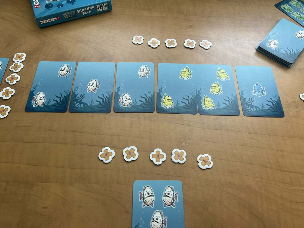 Piranha Flip Meeple Qc
